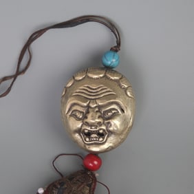 A FINE TIBETAN BUDDHISM BRONZE PENDANT