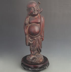 A FINE COLORED WOODEN LACQUERED STATUE OF A MONK