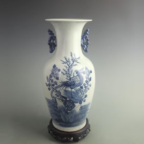 BLUE AND WHITE FLORAL DOUBLE-HANDLED PORCELAIN VASE