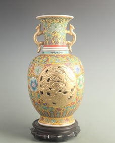 YELLOW-GROUND DOUBLE-SIDED CARVED DRAGON AND PHOENIX PORCELAIN VASE