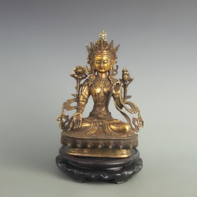 A FINE GILT BRONZE GREEN TARA STATUE