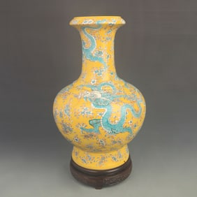 FAMILLE ROSE YELLOW GROUND DRAGON PATTERN MOUTH PORCELAIN VASE