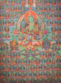 A FINE TIBETAN THANGKA MOUNTED ON PAPER