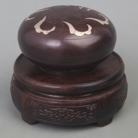 A ROUND BRONZE INKBOX INLAY WITH SILVER PATTERN