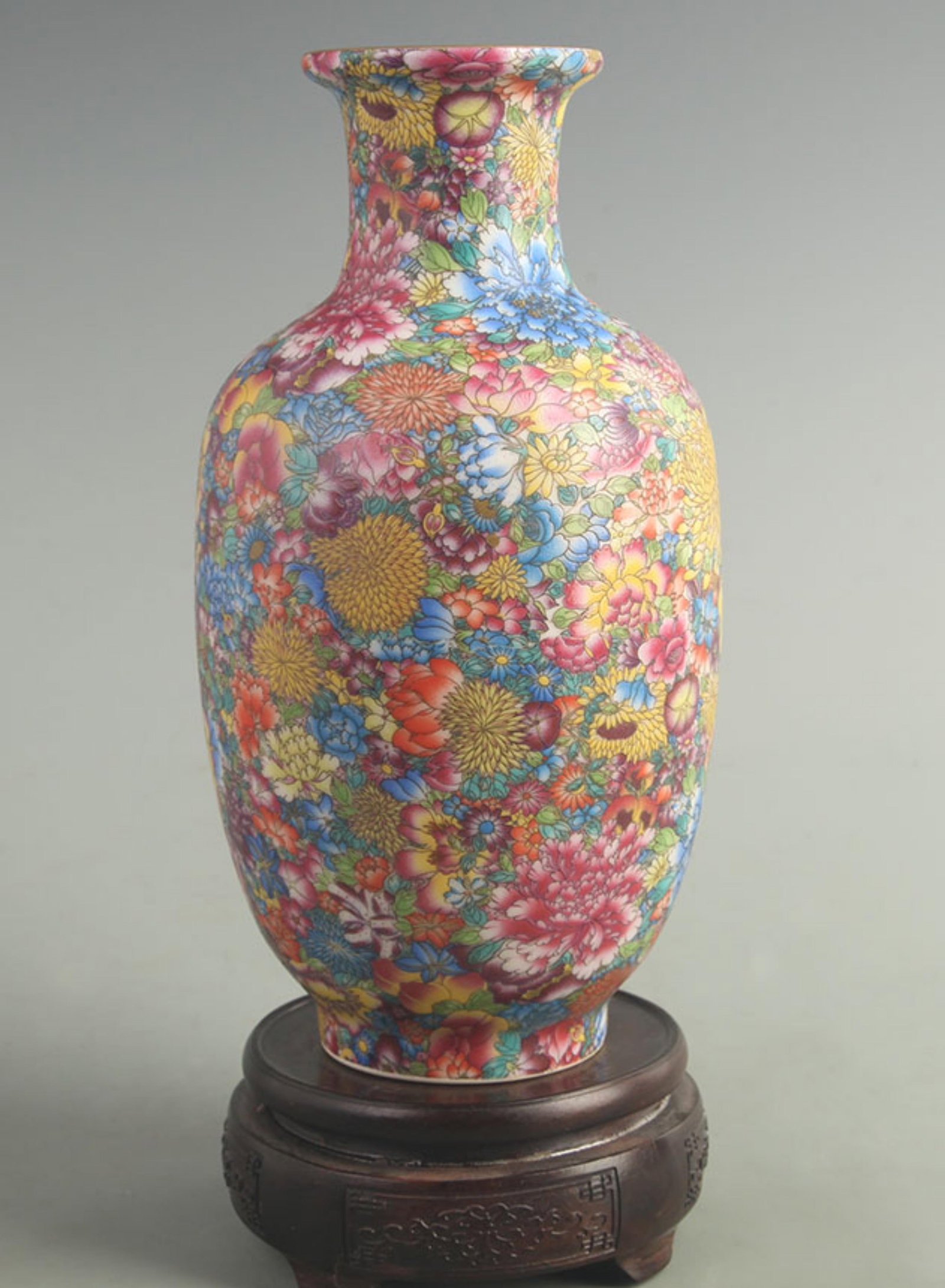 HUNDRED FLOWERS PATTERN WINTER MELON STYLE PORCELAIN VASE: Qing Dynasty Qian Long Period; High: 9.50 inch; Width: 4.50 inch