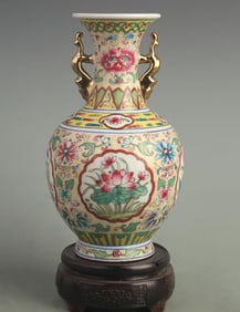 A FINE ENAMEL COLOR DOUBLE HANDLED FLORAL PORCELAIN VASE