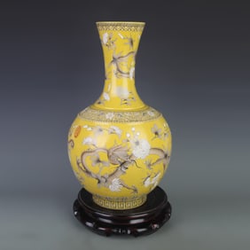 BLUE-AND-WHITE YELLOW GROUND VASE WITH DRAGONS AND FLOWERS