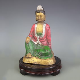 A FINE COLORED BRONZE GUANYIN STATUE