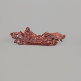 A FINE BOXWOOD MADE BRUSH REST