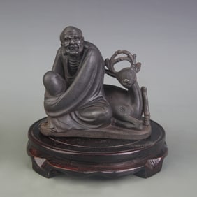 A FINE CAST IRON ARHAT STATUE