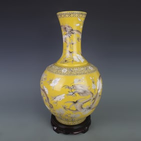 FAMILLE ROSE YELLOW GROUND FLORAL DRAGON GLOBE VASE