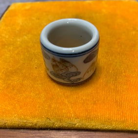 QING DYNASTY BLUE AND WHITE UNDERGLAZE RED "FU" CHARACTER THUMB RINGS