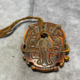 MING DYNASTY BONE PENDANT WITH BEAST MASK DESIGN
