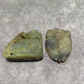 SONG DYNASTY HETIAN JADE ANIMAL MOTIF PENDANTS (2 PIECES)