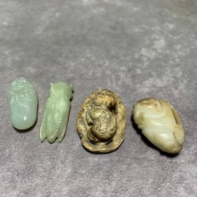 QING DYNASTY HETIAN GREENISH-WHITE JADE PENDANT (4 PIECES)