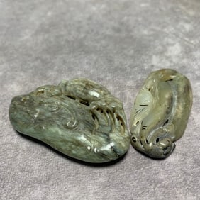 MING DYNASTY HETIAN JADE BIRD AND CLAW PENDANTS (2 PIECES)