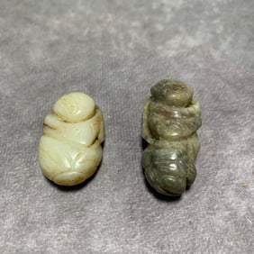 QING DYNASTY HETIAN WHITE JADE FIGURE PENDANTS (2 PIECES)