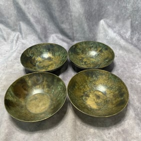 SET OF FOUR BRONZE BOWLS WITH LION DESIGN REPRESENTING THE FOUR SEASONS