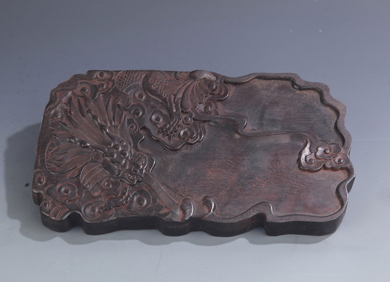 A FINELY CARVED ROSEWOOD BRUSH LICK JAR: 20th Century, High: 0.75 inch; Long: 9.5 inch; Width: 5.5 inch;