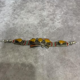 A FINE WHITE BRONZE BRACELET WITH GEMSTONES