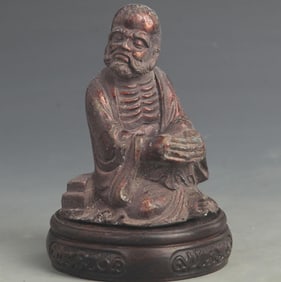 A FINE COLORED BRONZE ARHAT STATUE