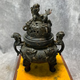 QIANLONG MARK GILDED BRONZE LION AND DRAGON INCENSE BURNER