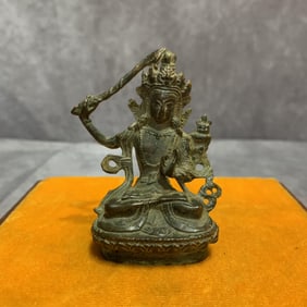 A FINE SMALL BRONZE MANJUSHRI BUDDHA STATUE