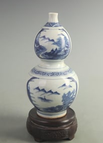 BLUE AND WHITE GOURD-SHAPED PORCELAIN VASE WITH LANDSCAPE DESGIN