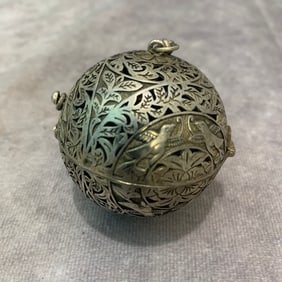 A FINE WHITE BRONZE HANGING INCENSE BURNER BALL