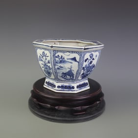 BLUE-AND-WHITE OCTAGONAL FLOWERPOT WITH FLORAL PANELS