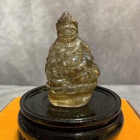 A FINE GLASS MADE BUDDHA STATUE