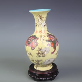 FAMILLE ROSE YELLOW GROUND AUSPICIOUS BEAST PATTERN PORCELAIN VASE