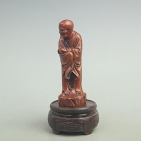 A FINE BOXWOOD CARVED FIGURINE OF A PERSON