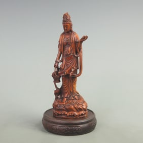 A FINELY CARVED BOXWOOD FIGURE OF GUAN YIN