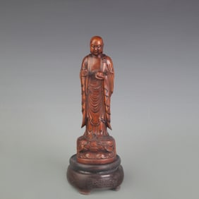A FINE BOXWOOD MADE BUDDHIST STATUE