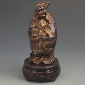 LACQUERED WOOD GILDED LOTUS BOY STATUE