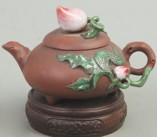 A FINELY CARVED ZI SHA TEAPOT