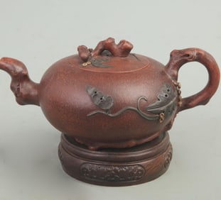 A FINELY CARVED ZI SHA TEAPOT