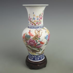 A FAMILLE ROSE FLOWER AND BIRD PATTERN PORCELAIN VASE