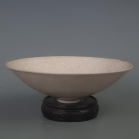 A DING KILN FLOWER CARVING PORCELAIN PLATE