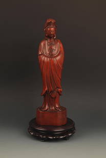 A FINELY CARVED BOXWOOD FIGURE OF GUAN YIN: 20th Century, High: 11.00 inch High: 2.75 inch