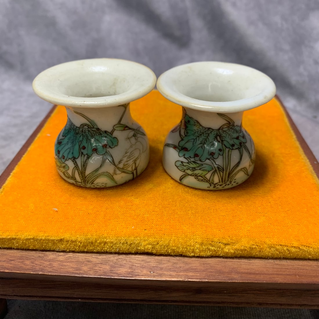 PAIR OF QING DYNASTY FAMILLE ROSE FLORAL WINE CUPS: Qing Dynasty; High: 1.7 inch; Diameter: 2 inch