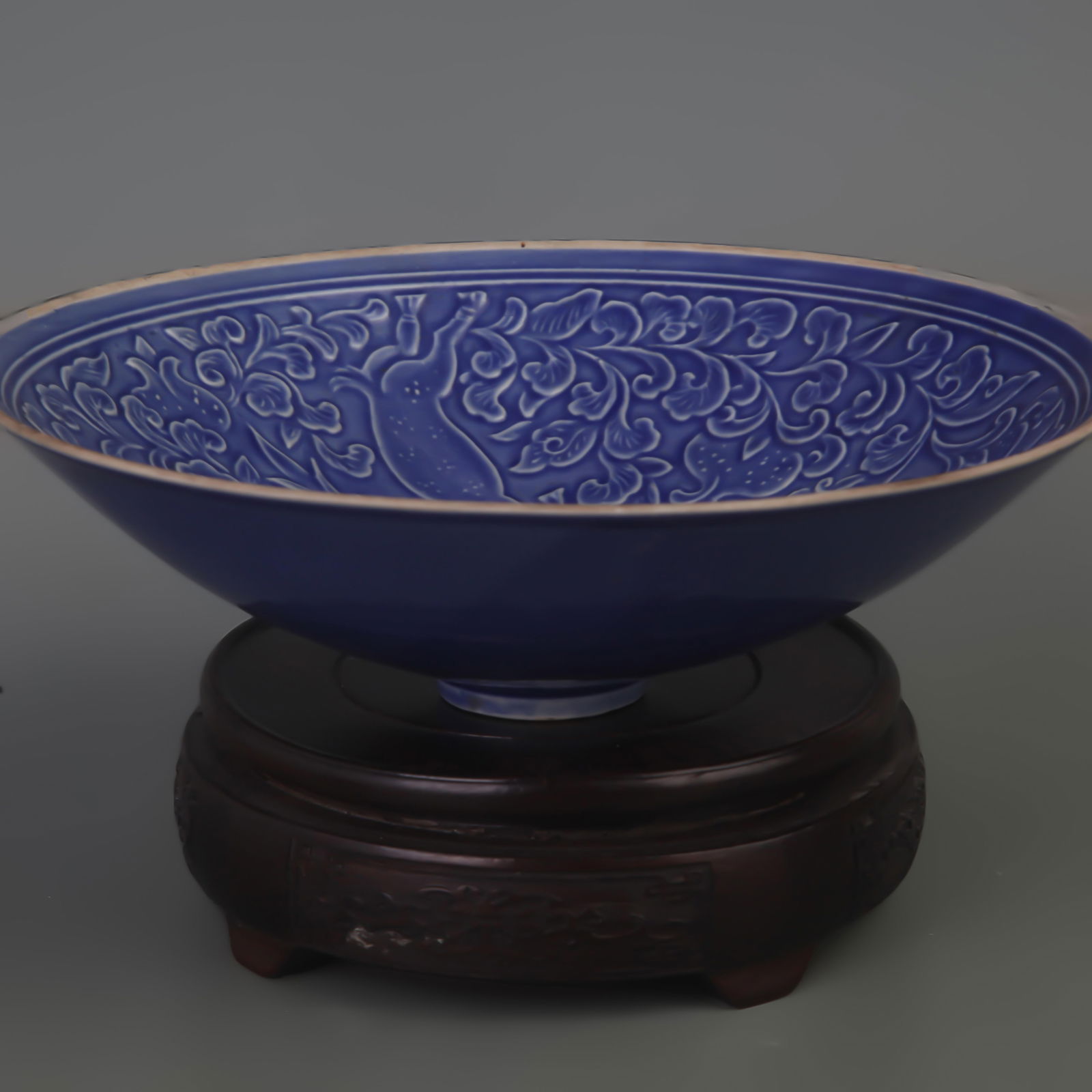 SACRIFICIAL BLUE GLAZED CARVED FLORAL AND BIRD PORCELAIN BOWL (1 of 5)