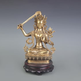 A FINE BRONZE MANJUSHRI BODHISATTVA STATUE
