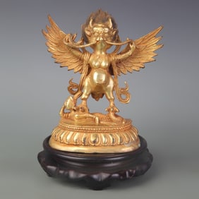 A FINE GILT BRONZE GARUDA STATUE