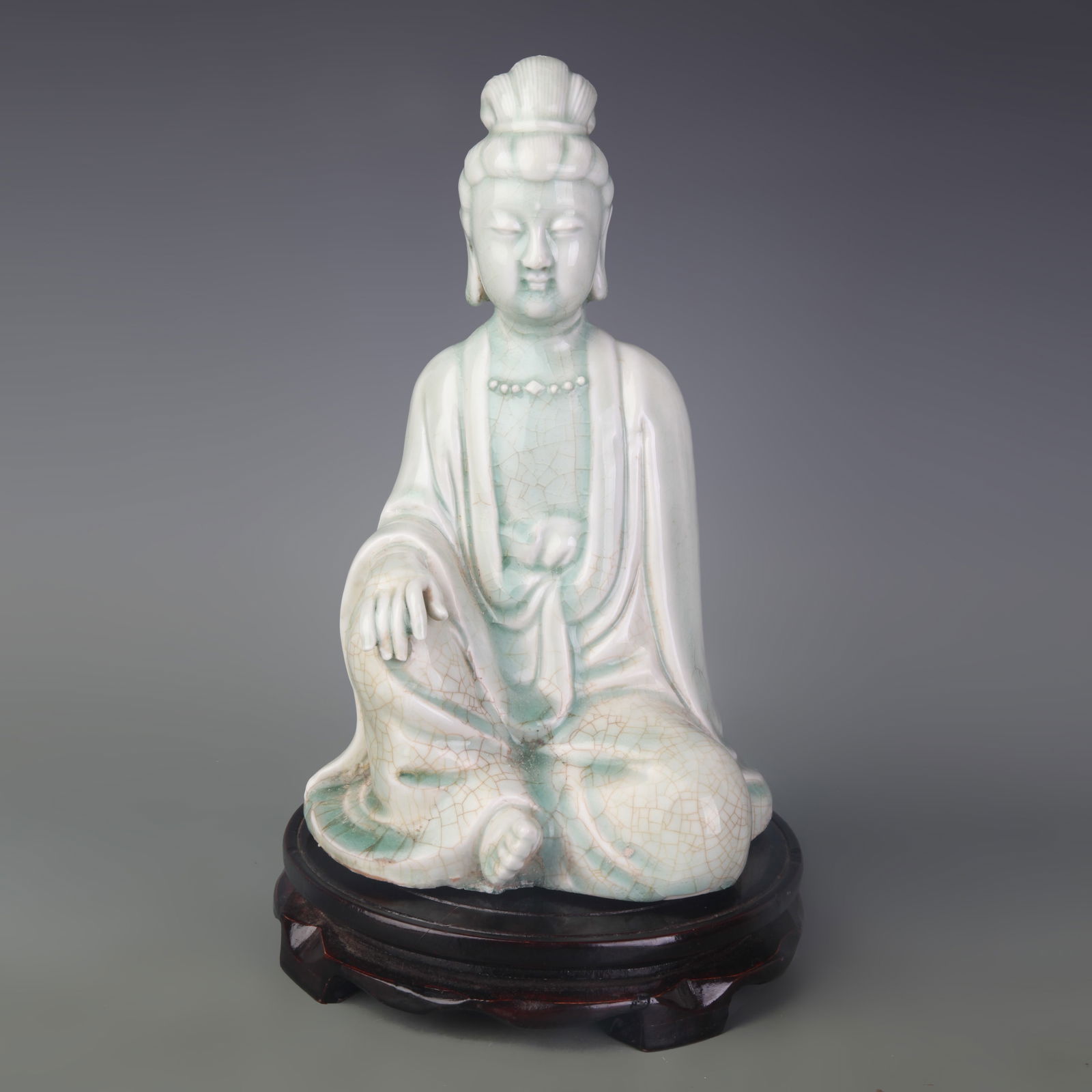 SHADOW GREEN GLAZE PORCELAIN GUANYIN SEATED STATUE: Qing Dynasty; Width: 6.1 inch; High: 10.0 inch