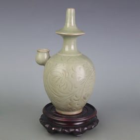 A FINE CELADON COLOR GLAZED FLOWER CARVING TEAPOT