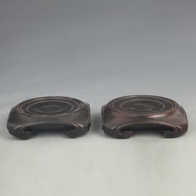 PAIR OF ROSEWOOD CARVED ROUND STANDS