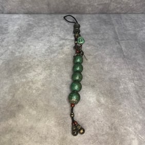A FINE TURQUOISE STONE MADE PENDANT