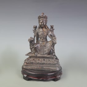 A FINELY CARVED GUAN YIN BRONZE STATUE